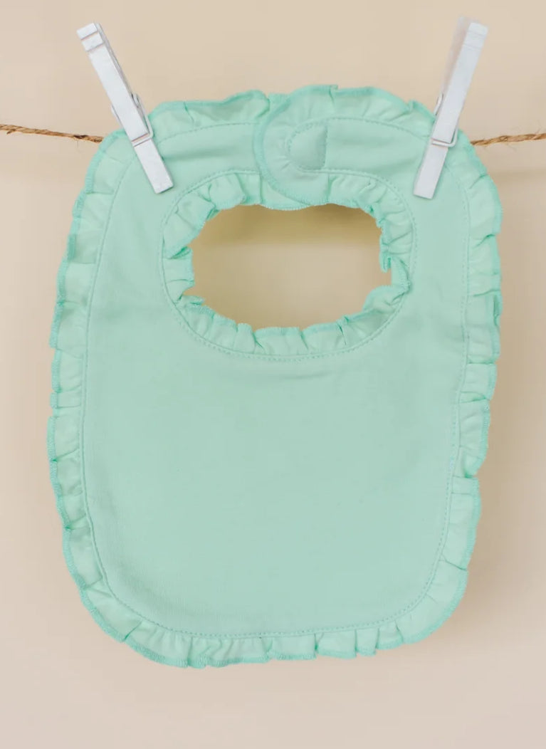Monogrammed ruffled bib