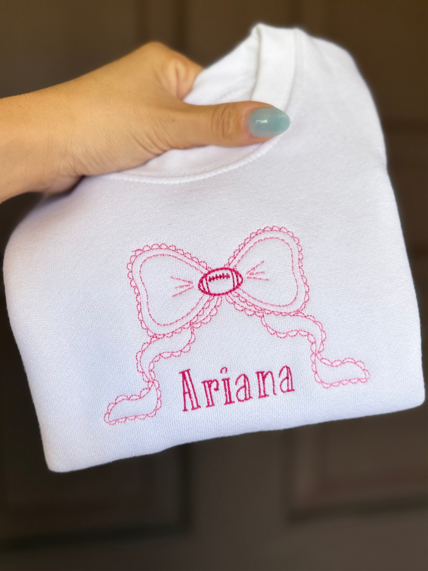 Football bow sweatshirt